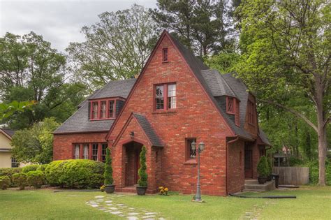 black metal roof on red brick house|roof colors for brick house.